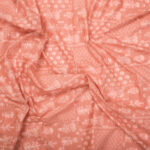 Floral print on peach cotton fabric
